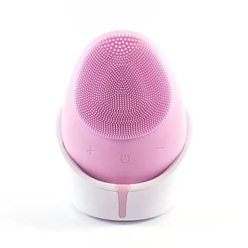 Dit is een foto van een elektrische gezichtsreiniger - gezichtsborstel. Dit is een nieuw model in de kleur roze inclusief standaard.